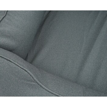 Nahaufnahme eines weichen, strukturierten grauen Haustierbettes mit einem plüschigen Design, ideal für den Komfort von Haustieren.