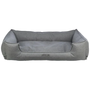 Graues Haustierbett mit erhöhten Seiten und einem weichen Kissen, mit einem kleinen Etikett, das "homeEdition" liest.