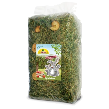 Un sac de foin JR FARM Apfelwiese, présentant de l'herbe verte et des tranches de pomme séchées, avec un lapin de dessin animé sur l'étiquette et le texte "Gratis Aufkleber."