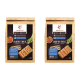 Zwei Beutel Wildfang Hundefutter, beschriftet mit "Lachs mit Forelle", mit Süßkartoffeln und Spargel, jeweils 2 kg.