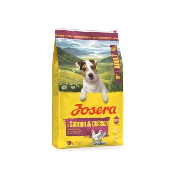 Gelber Josera-Hundefutterbeutel mit Aufschrift 'Salmon & Chicken', Hundebild und Landschaftsillustration; Kennzeichnungen: Adult, Mini, German Quality, 80%.