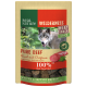 Eine Tierfutterverpackung mit einem Wolf, beschriftet "Real Nature Wilderness Meat Snack Soft," mit "Pure Beef" und "Rind mit Oregano" deutlich angezeigt.