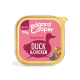 Nourriture pour chiots sans céréales Edgard Cooper dans un contenant de 150g, avec une étiquette rose et un graphique de canard et le texte "Duck & Chicken."