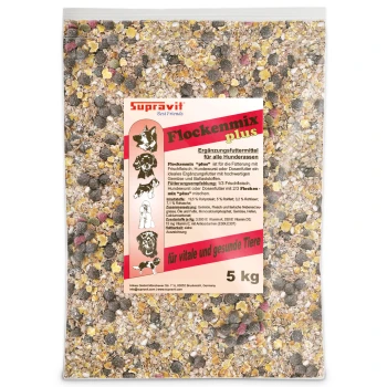 Nahaufnahme von gemischtem Vogelfutter mit gelben Flocken, braunen Pellets, roten und grünen Stücken sowie weißen Körnern.