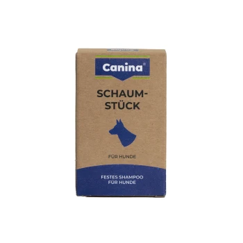 Canina-Schachtel mit festem Hundeshampoo „Schaumstück“, blaues Hundeprofil und die Texte „Für Hunde“ und „Festes Shampoo“.