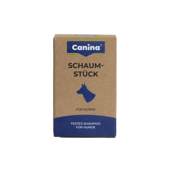 Canina-Schachtel mit festem Hundeshampoo „Schaumstück“, blaues Hundeprofil und die Texte „Für Hunde“ und „Festes Shampoo“.