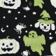 Black pet sweater fabric with green ghost, white jack-o'-lanterns, spiders, stars and a dog in a witch hat pattern.
