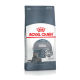 Sac de nourriture pour chats Royal Canin Oral Care avec un chat gris, avec un texte mettant en avant "RÉSULTATS PROUVÉS" et "FORMATION DE BACTÉRIES RÉDUITE JUSQU'À 59%".