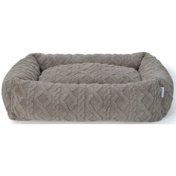 Bett Fashion M Ein plüschiges, graues Haustierbett mit einem strukturierten Rautenmuster und erhöhten Kanten, entworfen für Komfort und Unterstützung.