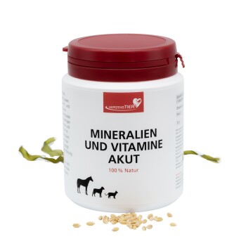 Weißer Behälter mit rotem Deckel, beschriftet mit „Mineralien und Vitamine Akut 100% Natur“ für Hunde, mit Hundesilhouetten auf dem Etikett.