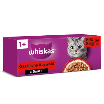 Fioletowe opakowanie multipack Whiskas z wizerunkiem szarego pręgowanego kota i miską mokrej karmy; widoczne napisy 'Klassische Auswahl', 'in Sauce', '1+', '80x85g'.