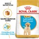 Royal Canin Puppy Labrador Retriever hondenvoerzak, met ras-specifieke brokjes, met tekst die ondersteuning voor natuurlijke afweer benadrukt.