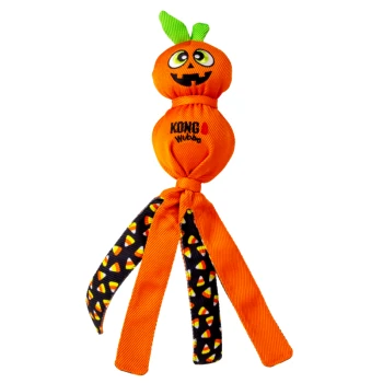 KONG Wubba Halloween dog toy: orange jack-o'-lantern head, knotted body with green leaves, orange and candy-corn patterned legs.