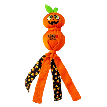 KONG Wubba Halloween dog toy: orange jack-o'-lantern head, knotted body with green leaves, orange and candy-corn patterned legs.