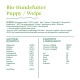 Bio-Hundefutter für Welpen, das Zutaten wie Huhn, Hafer und Fischöl auflistet. Nährwertinformationen umfassen Proteine, Vitamine und Mineralien.