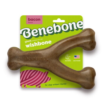 A brown, Y-shaped dog chew toy with rounded ends, featuring the embossed text "BONE" on one side.