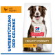 Hill's Science Plan 'Healthy Mobility' Hundefuttertüte mit lächelndem Hund; sichtbare Texte 'UNTERSTÜTZUNG DER GELENKE', 'mit HUHN', 'with CHICKEN'.