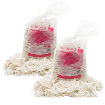 Zwei Taschen mit 'safebed' Papierstreu für Haustiere, jeweils 2 kg, mit zerrissenem weißen Papier, das herausquillt, und pinken Akzenten auf der Verpackung.