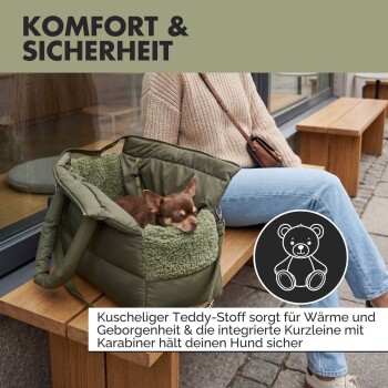 Olivgrüne Hundetragetasche mit weichem Teddystoff-Innenfutter und integriertem Leinenkarabiner für Komfort und Sicherheit.