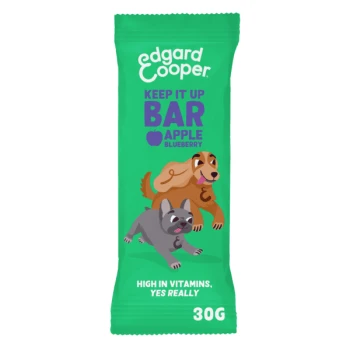 Riegel Apfel und Blaubeere 30 g Die Verpackung der Edgard Cooper Keep It Up Bar zeigt einen Golden Retriever und einen Französischen Bulldoggen, mit "Reich an Vitaminen, ja wirklich" und Apfel-Blaubeer-Geschmack.