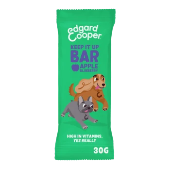 Edgard Cooper Keep It Up Bar packaging shows a golden retriever and French bulldog, with "High in vitamins, yes really" and apple-blueberry flavors.