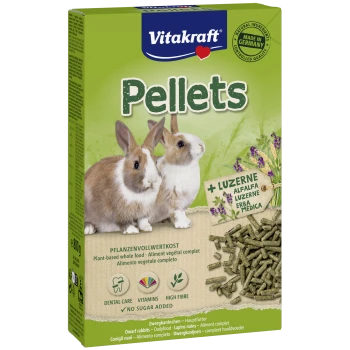 Boîte de Vitakraft Pellets pour lapins nains, deux lapins représentés, étiquette luzerne et granulés verts visibles.