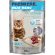 Un chat est assis à côté d'un sachet de nourriture pour animaux "Premiere Meat Menu" de bœuf et de morue, étiqueté "100 % viande fraîche" et sans céréales.