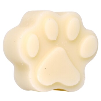 Eine cremig gelbe, pfotenförmige Seife, die für Haustiere entworfen wurde, mit abgerundeten Zehen und einem herzförmigen Polster in der Mitte.