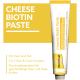 GimCat Cheese Biotin Paste Tube, gelb-weiße Verpackung mit Aufschrift CHEESE BIOTIN PASTE und Hinweis 'Unterstützt Haut, Fell & feste Krallen'.