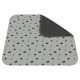 Gray pet mat featuring black paw prints and bones, with "Simple Solution" logos scattered across the surface.