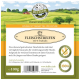 Etikett für Bellfor Hundeleckerlis: "Fleischstreifen 100% Truthahn" für empfindliche Hunde, mit Nährwertinformationen und malerischem Hintergrund.