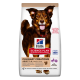 Sac de nourriture pour chiens avec un chien marron heureux, étiqueté "Hill's Science Plan Culinary Creations," pour chiens adultes (11-25 kg) avec canard et pommes de terre.