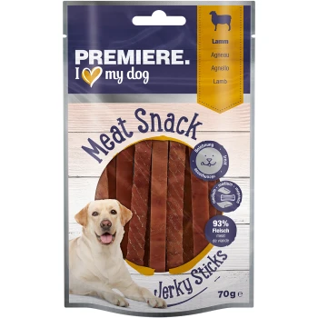 Fleischsnack-Jerky-Sticks für Hunde, mit einer Verpackung, die den Text "PREMIERE. I ❤️ my dog" und "93% Fleisch" auf einem Holz-Hintergrund zeigt.