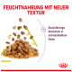 Feuchtfutter mit neuer Textur, zeigt gleichförmige Stückchen in schmackhaftem Gelee, auf weißem Hintergrund mit rotem und lila Text.
