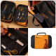 Fiskars-Pflegeset für Haustiere in schwarz-orangefarbener Tasche mit Schere, Kamm, Feile und Handtuch; Beschriftung 'FISKARS'.