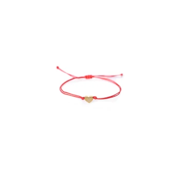 Red adjustable bracelet with a gold heart charm featuring a small paw print, on a white background.