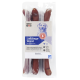 Paquet de quatre saucisses pour chiens étiqueté "Lieblings-Wurst" avec un design bleu et beige, présentant une illustration de chien et une mention sans gluten.