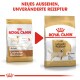Zwei Beutel Royal Canin Hundefutter für Labradore, beschriftet mit "Adult" und "Labrador Retriever", mit einem roten Pfeil für neues Design.
