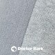 Nahaufnahme eines weichen, strukturierten grauen Stoffes mit einer glatten und flauschigen Seite, mit dem Logo "Doctor Bark" und "MADE IN GERMANY."