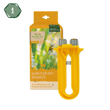 Gelbes Wachsdraht-Spannwerkzeug, das vor einer bunten Verpackung mit Blumen und einer Biene präsentiert wird, beschriftet mit "WABENDRAHT-SPANNER."