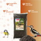 PANTO-Tüte Sonnenblumenkerne (schwarz), Samenhäufchen und zwei Vögel; sichtbarer Text "Energierreicher Snack".