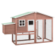 Holzhaustierhaus mit schrägem Dach, mehreren Fenstern, einem seitlichen Nistkasten und einem großen Netzgehege für kleine Tiere.
