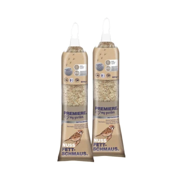 Deux paquets de nourriture pour oiseaux étiquetés "Premiere. J'aime mon jardin" avec une boule de graisse pour oiseaux, chacun pesant 500g.