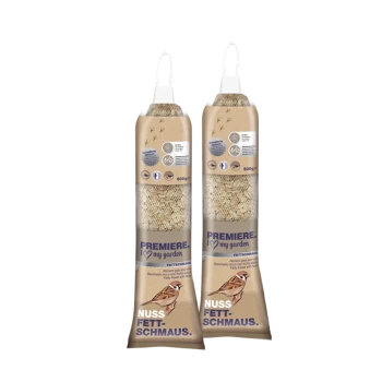 Deux paquets de nourriture pour oiseaux étiquetés "Premiere. J'aime mon jardin" avec une boule de graisse pour oiseaux, chacun pesant 500g.
