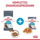 Royal Canin Urinary Care Haustierfutterverpackung mit Trockenfutter und Nassfutter, mit einem Katzenbild und dem Text 'Komplettes Ernährungsprogramm.'