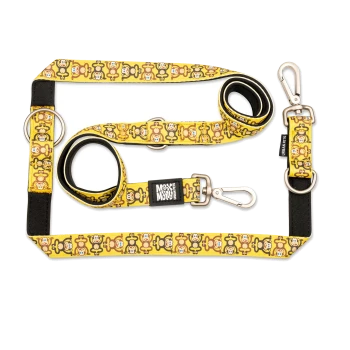 Gelbe Hundeleine mit Cartoon-Affenmuster, Metallclips und "Max & Molly" sowie "Urban Pets" Anhängern.