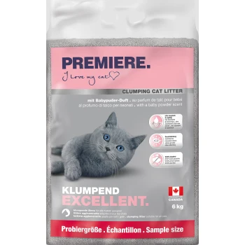 Emballage de litière pour chat agglomérante avec un chat gris aux yeux bleus, étiqueté "PREMIERE. I love my cat" et "CLUMPING CAT LITTER," avec un parfum de poudre pour bébé.