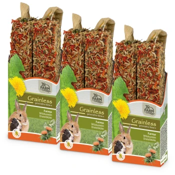 Drei JR FARM Getreidefreie Tierfutterpackungen mit bunten Kräutersticks für Kaninchen und Meerschweinchen, die Löwenzahn- und Wildblumensamen enthalten.
