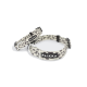 Hundehalsband im Leopardenmuster mit einem schwarzen "PAIKKA"-Label, mit verstellbaren Riemen und einem silbernen D-Ring zur Leinenbefestigung.