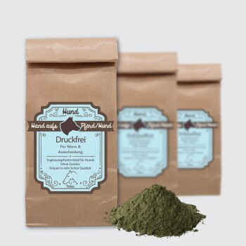 Braune Papiertüte mit der Bezeichnung 'Druckfrei' für Hundesupplemente, mit blauer Schrift, die Unterstützung für Nieren, Blase und Entgiftung beschreibt.